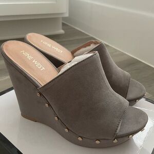 Never used, faux suede platform heals